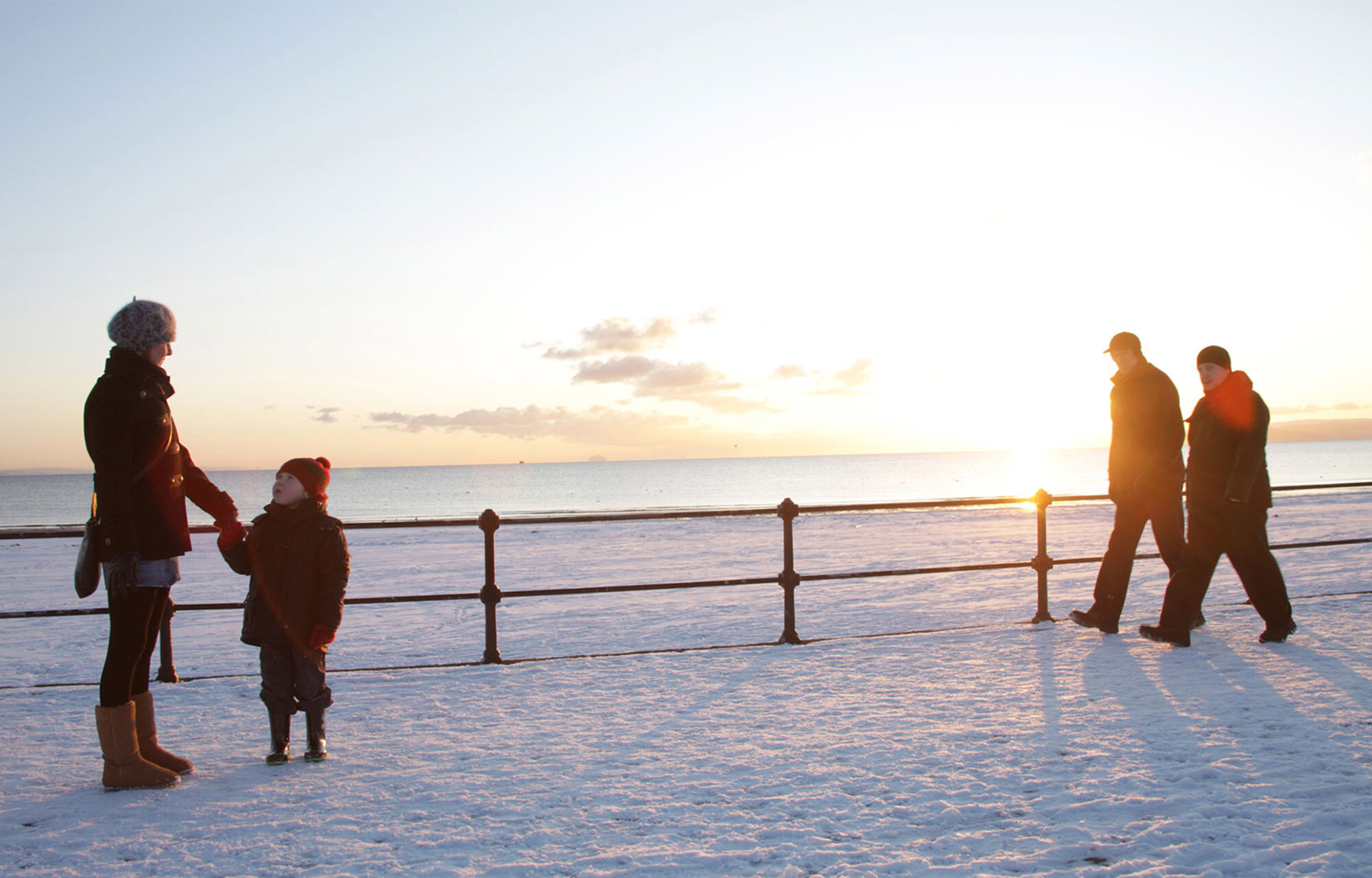 People out walking in the snow